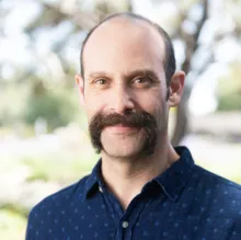 Speaker image - Adam Wolff